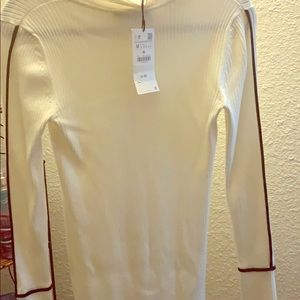 White ribbed dress with black strip down back arm